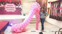 Super size high heels sandal made of balloons as a decor element for a fashion show theme teen birthday party